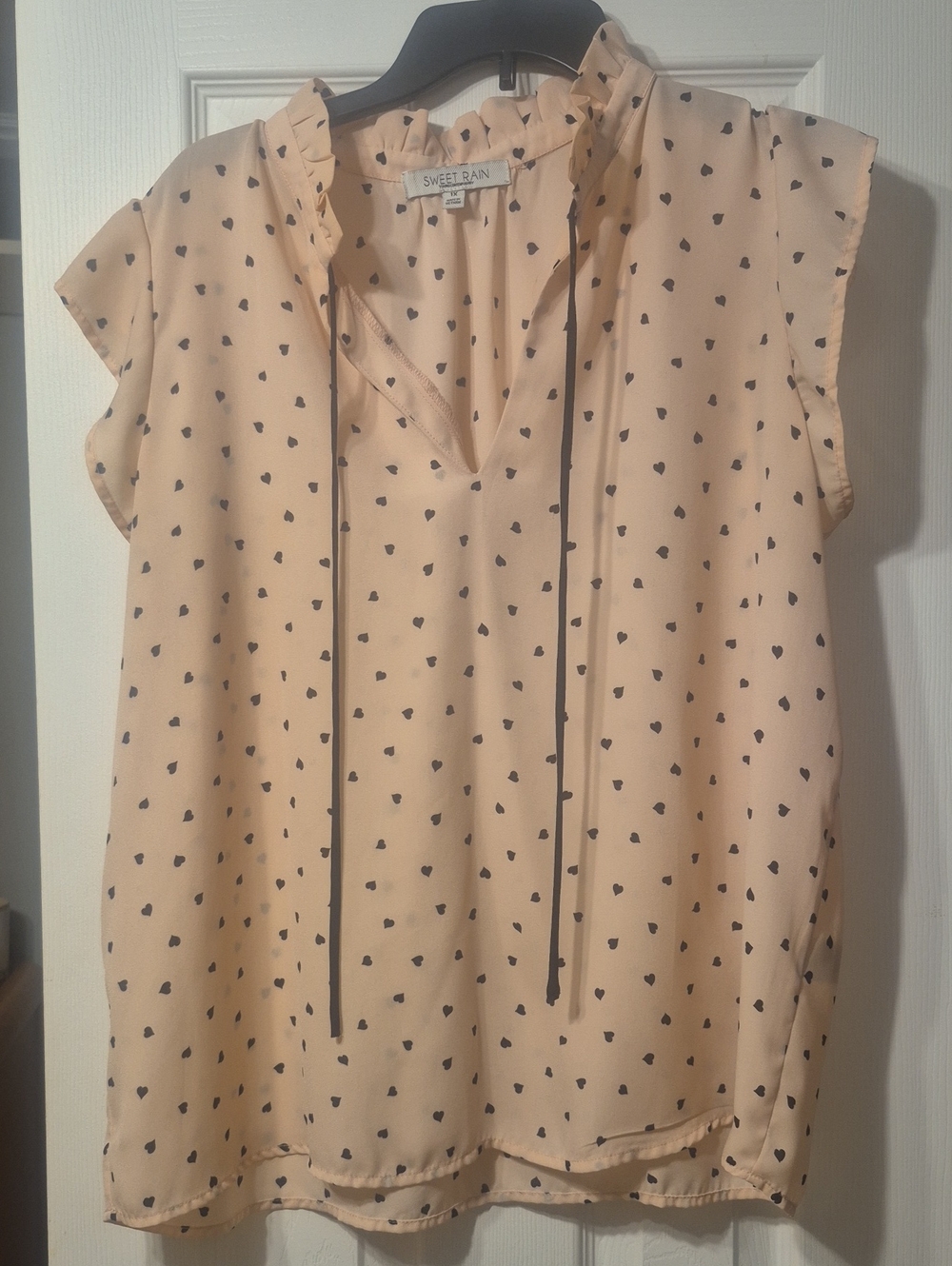 Sweet Rain Cream Cap-Sleeve Ruffle Neck Blouse with Black Heart Print